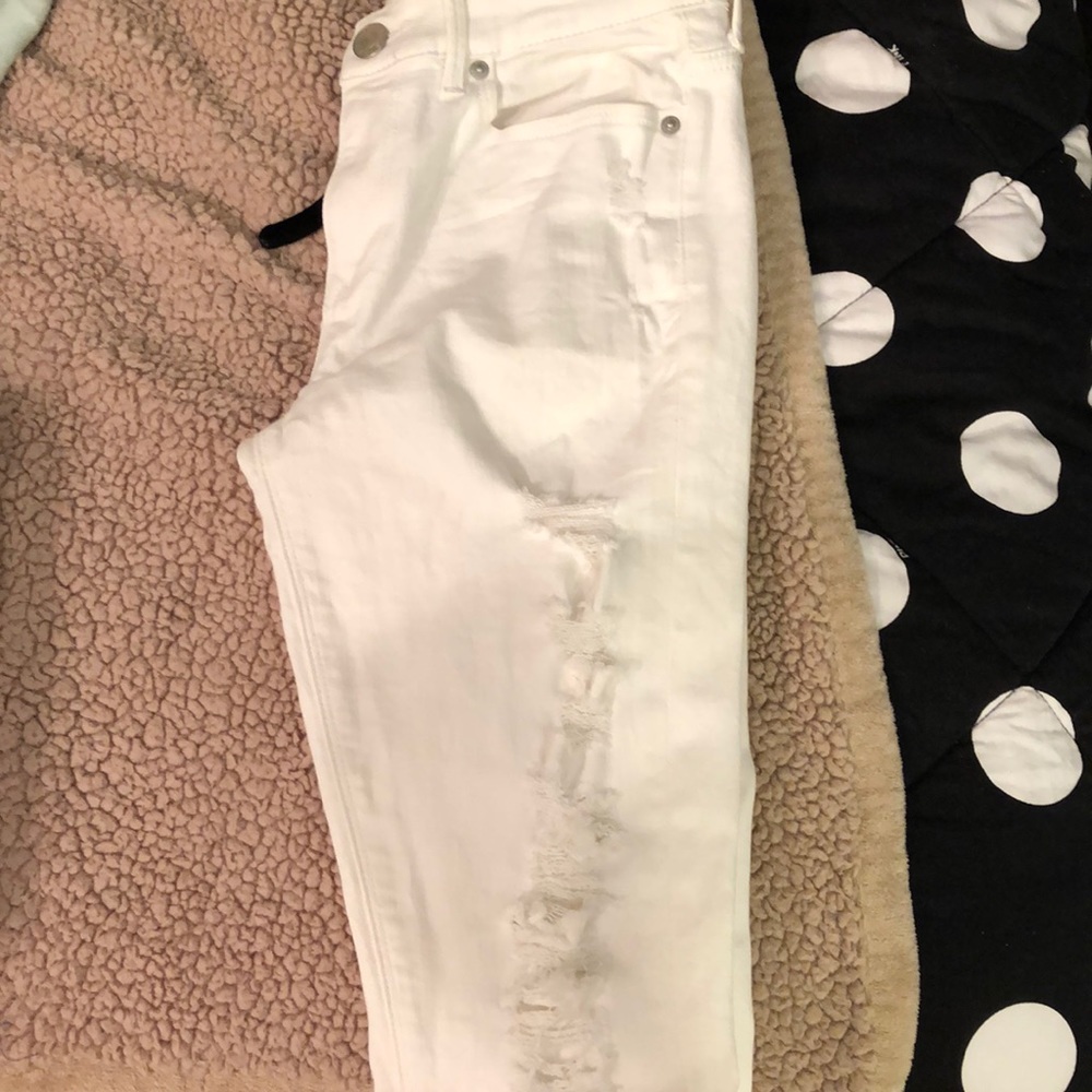 distressed white jeans